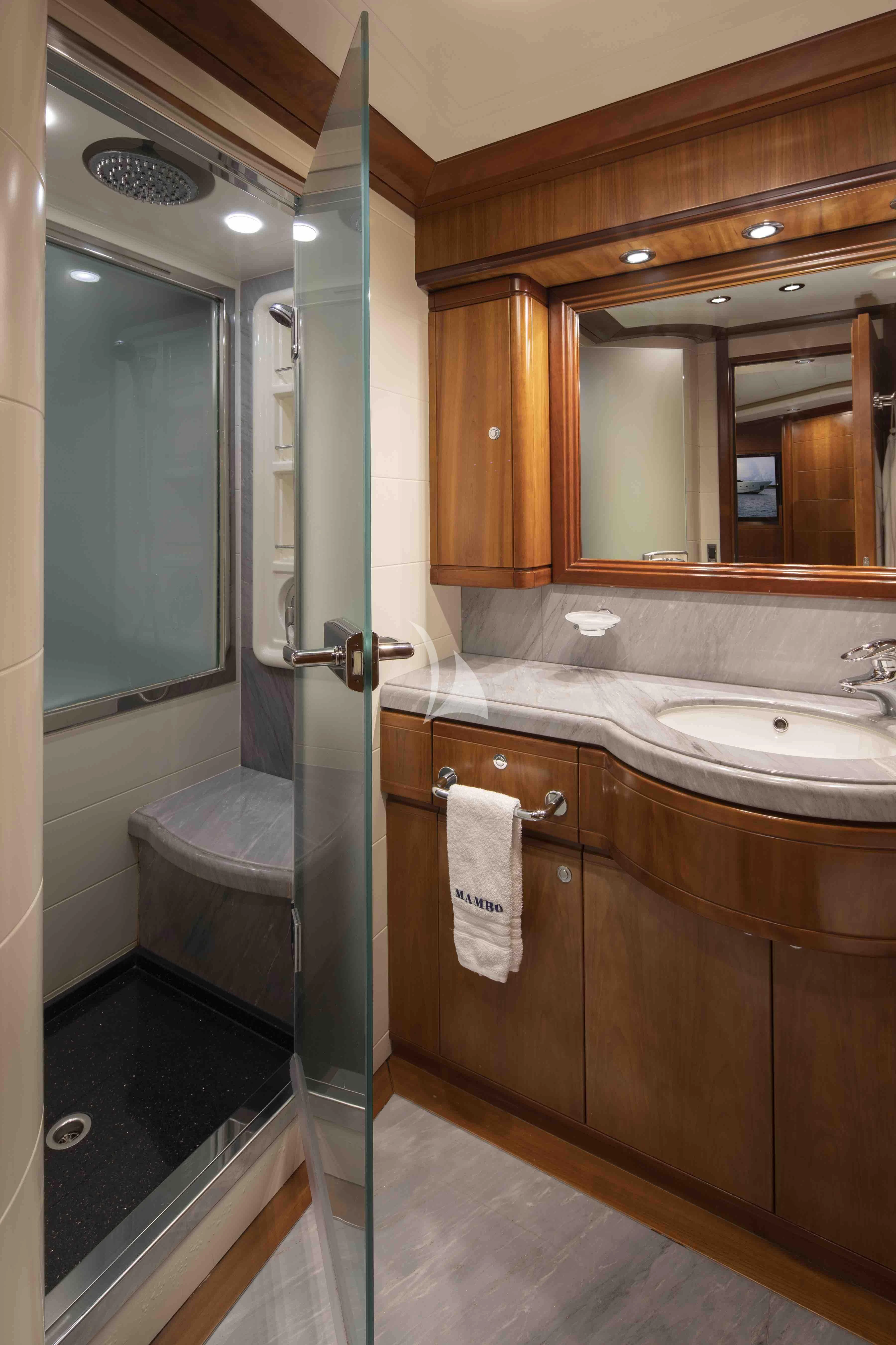 a bathroom with a stand up shower aboard MAMBO Yacht for Sale
