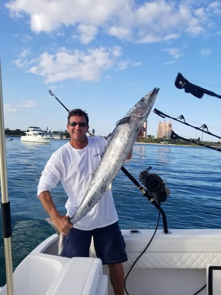 a man on a boat aboard MAMBO Yacht for Sale