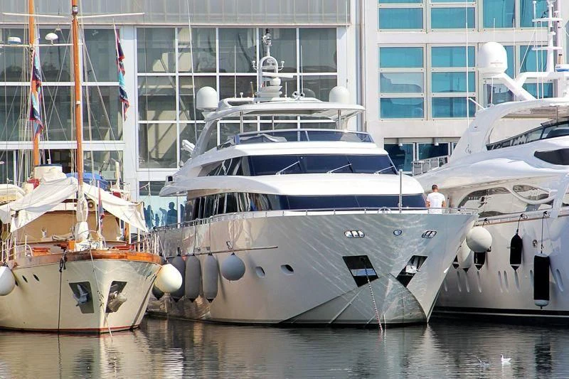 several boats in a harbor aboard ELAN Yacht for Sale