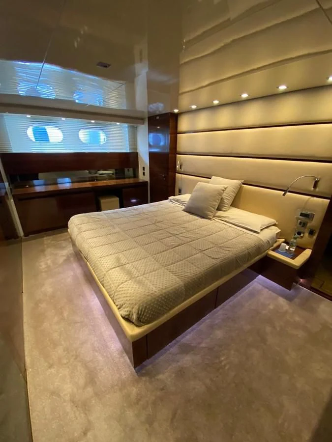 a bed in a room aboard ELAN Yacht for Sale