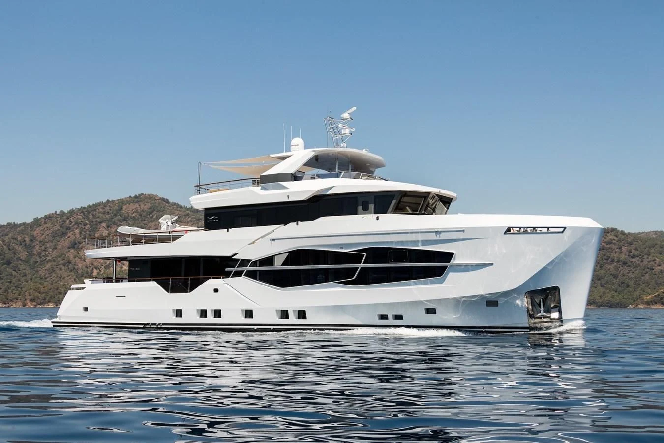 a white yacht on water aboard PROJECT 105 Yacht for Sale