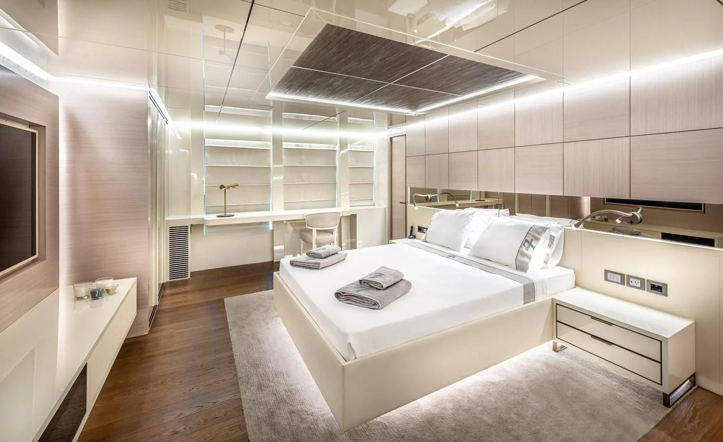 a room with a bed and a desk aboard PROJECT 105 Yacht for Sale