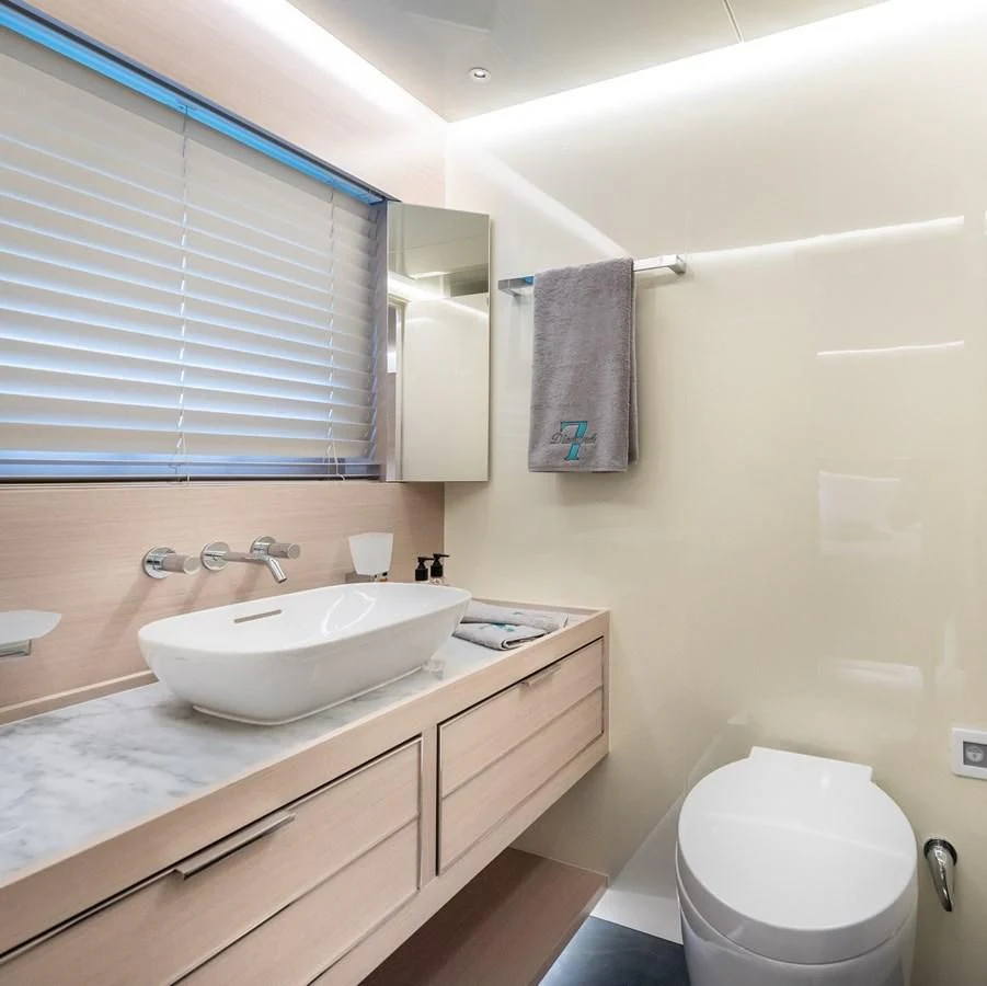 a bathroom with a sink and toilet aboard PROJECT 105 Yacht for Sale