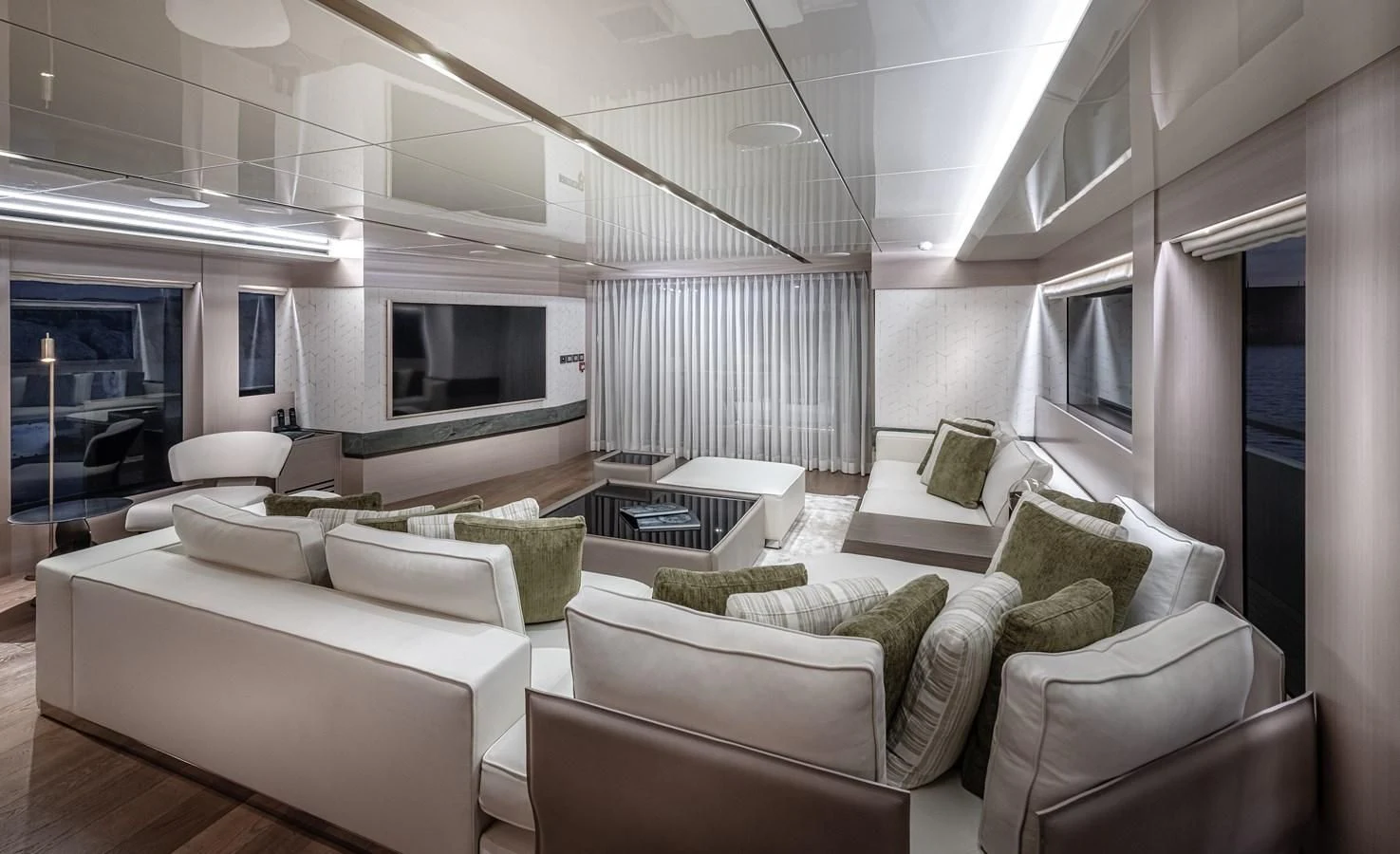 a living room with white couches aboard PROJECT 105 Yacht for Sale