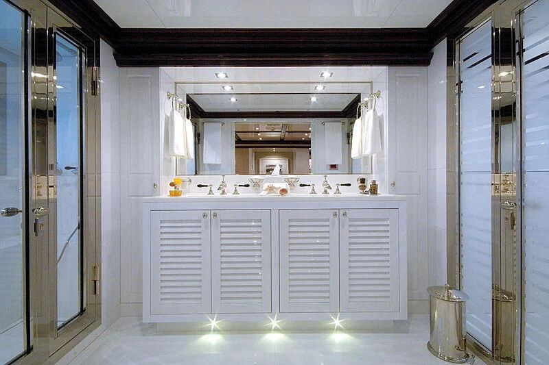a bathroom with a sink and cabinets aboard OXYGEN Yacht for Sale