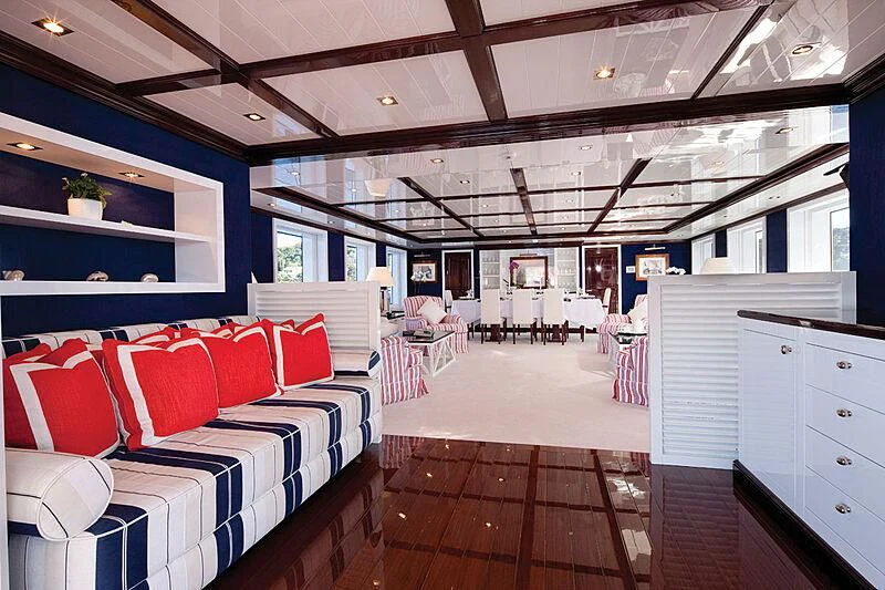 a room with a couch and a table aboard OXYGEN Yacht for Sale