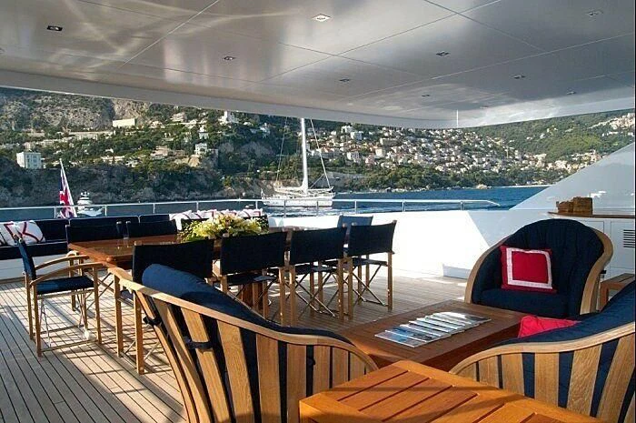 a room with a view of a city and a body of water aboard OXYGEN Yacht for Sale