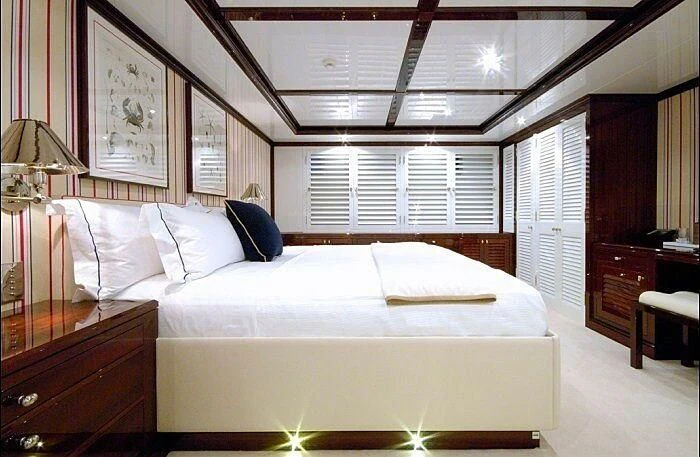 a bed in a room aboard OXYGEN Yacht for Sale