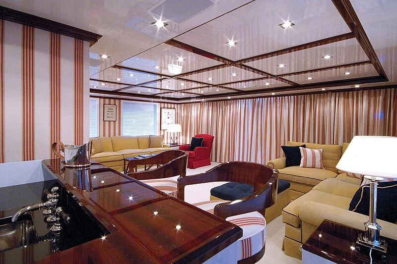 a living room with a large window aboard OXYGEN Yacht for Sale