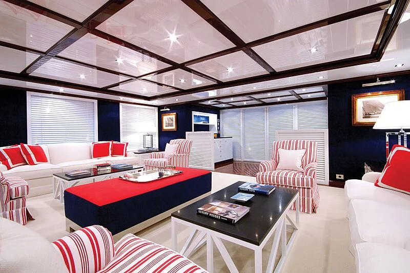 a room with a table and chairs aboard OXYGEN Yacht for Sale