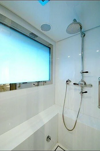 a shower with a glass window aboard OXYGEN Yacht for Sale