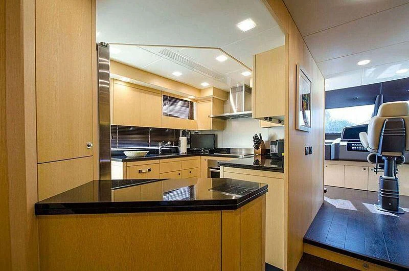 a kitchen with a large island aboard FULL CIRCLE Yacht for Sale