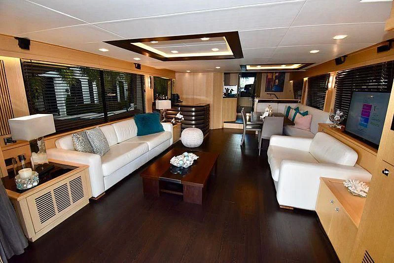 a living room with a large window aboard FULL CIRCLE Yacht for Sale