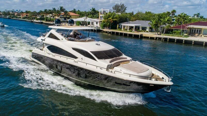 a white yacht on water aboard FULL CIRCLE Yacht for Sale