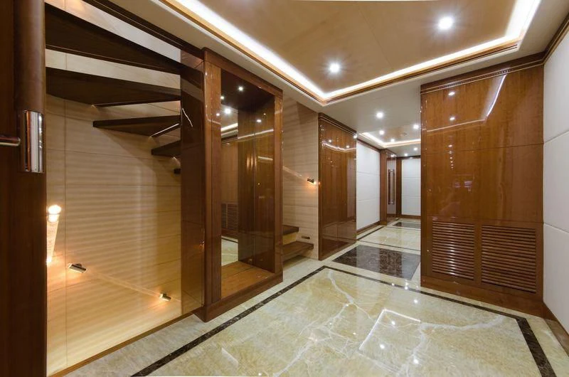 a room with a large glass wall aboard OBSESSION Yacht for Sale