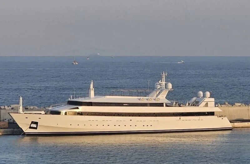 a large ship in the water aboard ADAMAS V Yacht for Sale