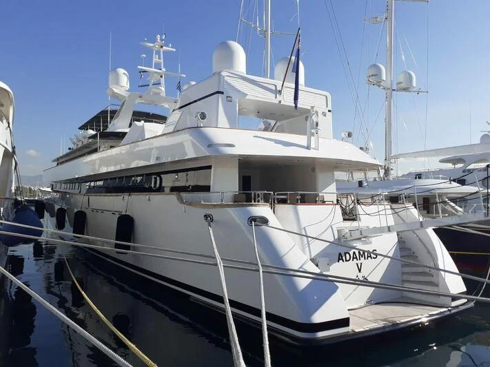 a large white boat aboard ADAMAS V Yacht for Sale