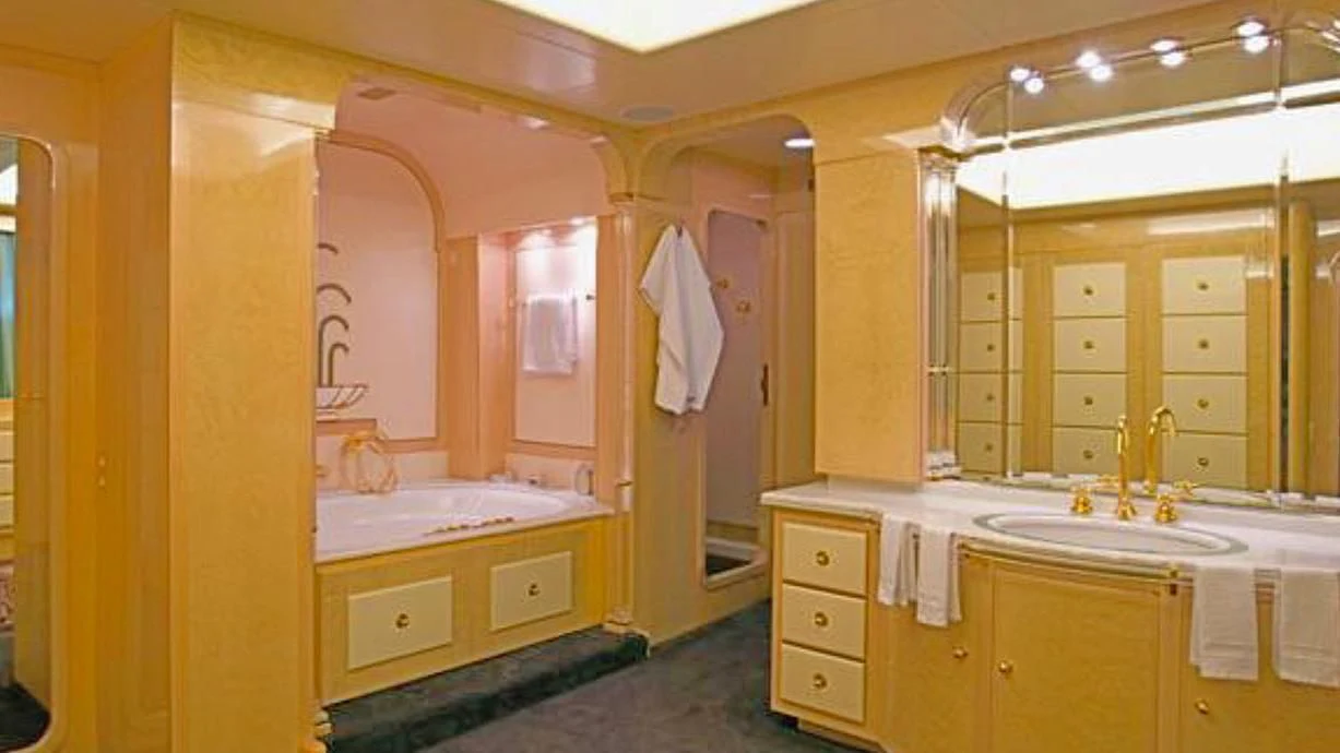 a bathroom with a sink and cabinets aboard ADAMAS V Yacht for Sale