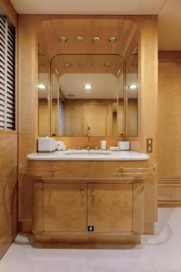 a bathroom with a large mirror aboard ADAMAS V Yacht for Sale