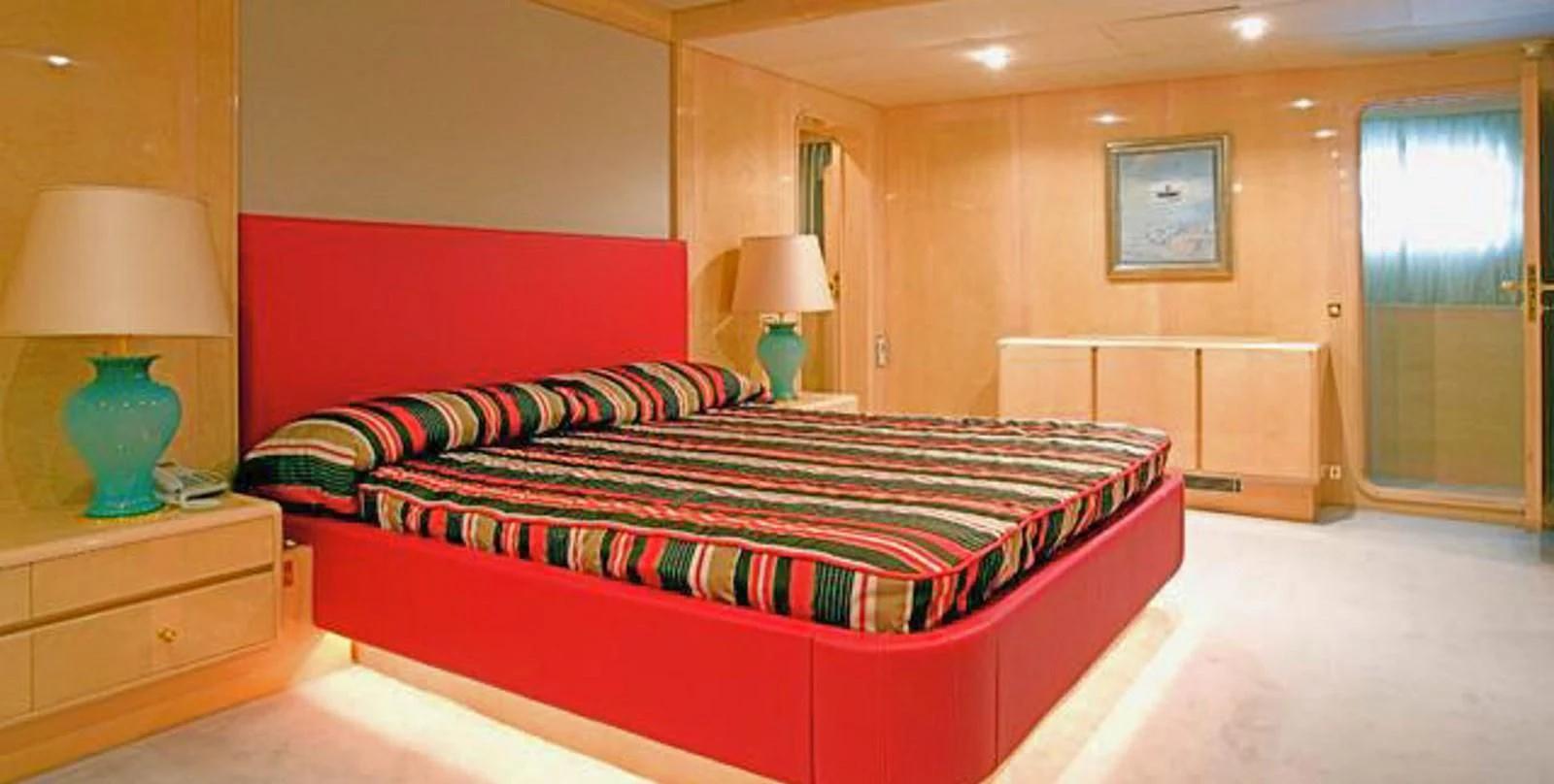a bed in a room aboard ADAMAS V Yacht for Sale