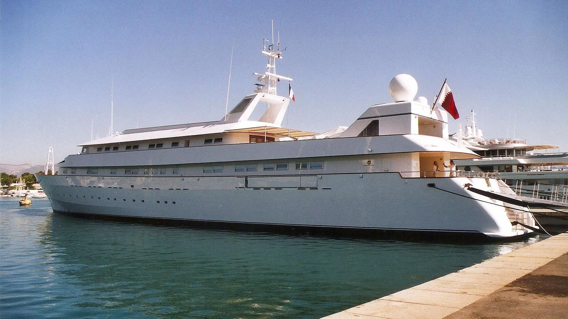 a large ship in the water aboard ADAMAS V Yacht for Sale