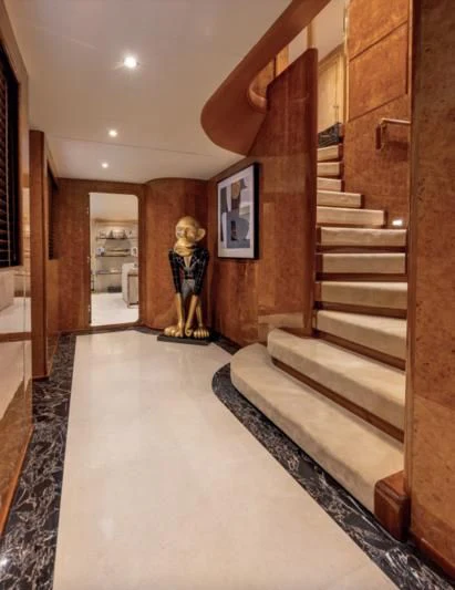 a statue in a room aboard ADAMAS V Yacht for Sale