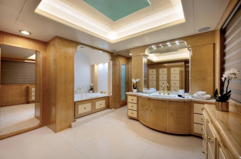 a bathroom with a large mirror aboard ADAMAS V Yacht for Sale