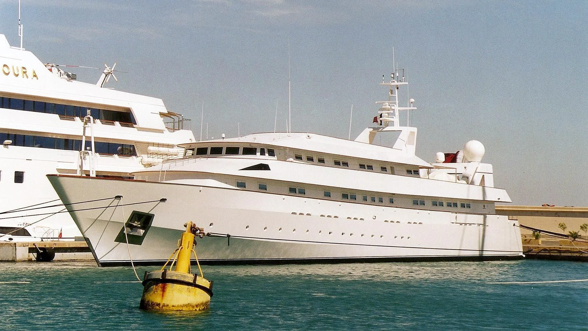 a large white boat in the water aboard ADAMAS V Yacht for Sale
