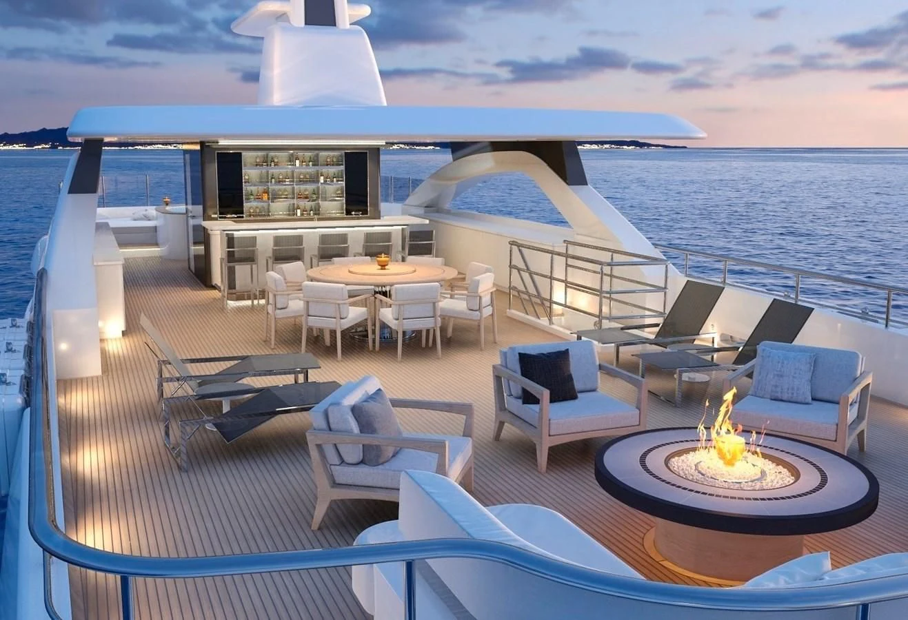 a deck with a table and chairs on it aboard BURGER 180 HULL 02 Yacht for Sale