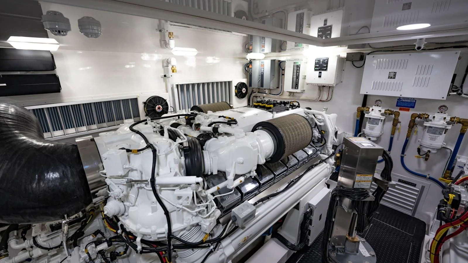 a room with machinery aboard WHY WOULDN'T WE Yacht for Sale