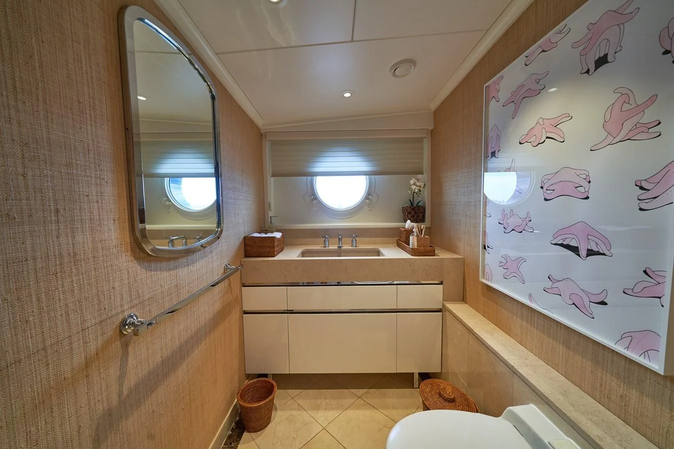 a bathroom with a sink and a mirror aboard ASTERIA Yacht for Charter