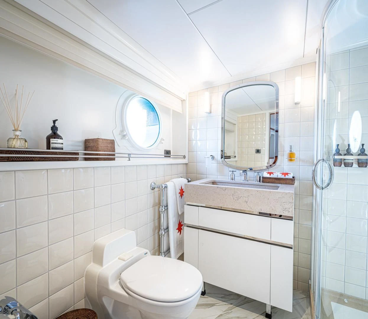 a bathroom with a glass shower aboard ASTERIA Yacht for Charter