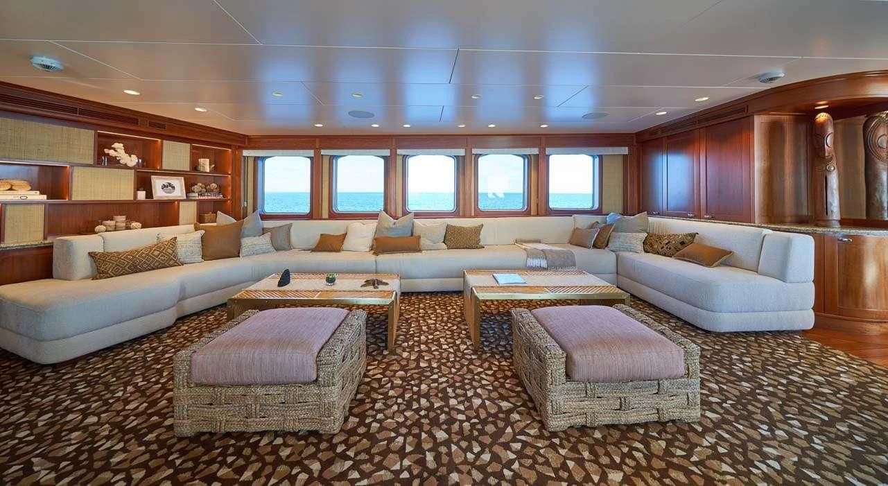 a large living room with a large window aboard ASTERIA Yacht for Charter