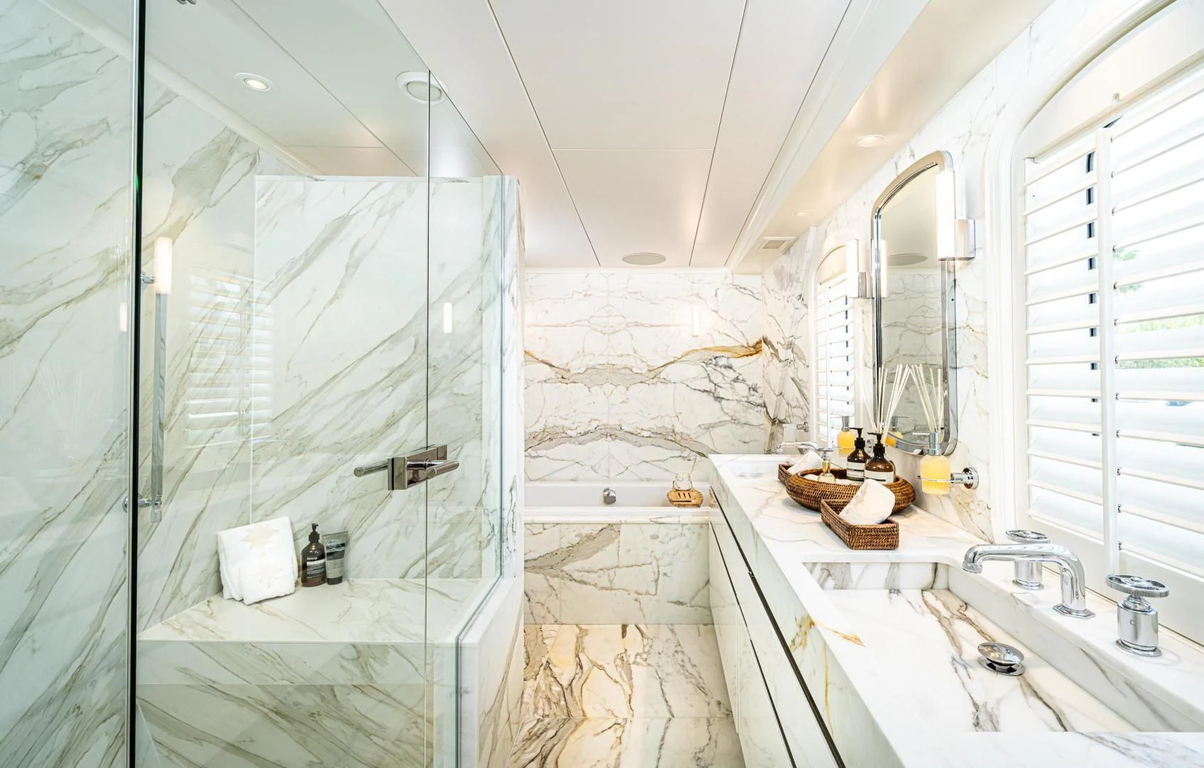a bathroom with a glass shower aboard ASTERIA Yacht for Charter