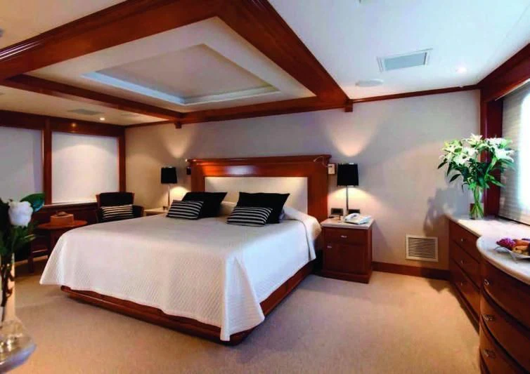 a large bedroom with a large bed aboard ASTERIA Yacht for Charter