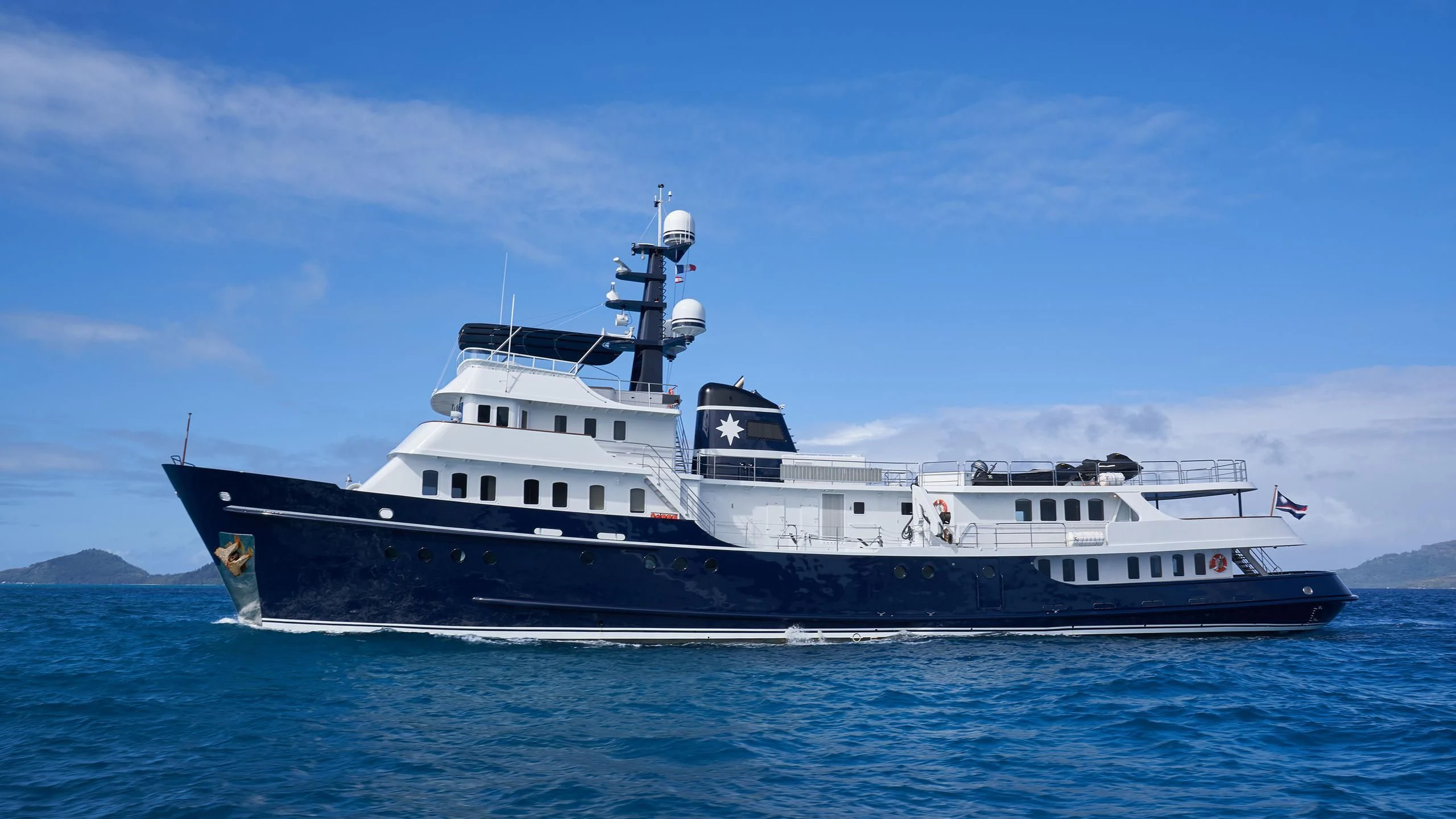 a large boat in the water aboard ASTERIA Yacht for Charter
