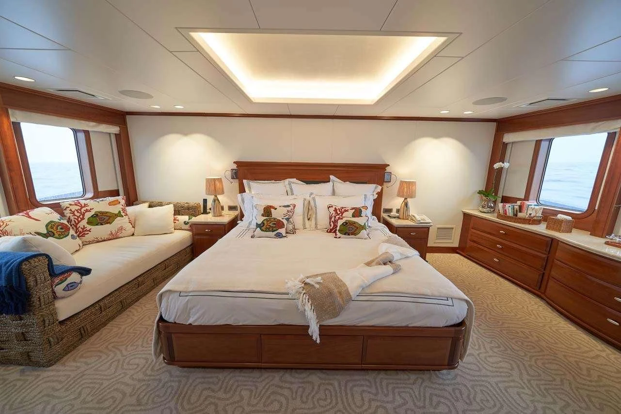 a bedroom with two beds aboard ASTERIA Yacht for Charter
