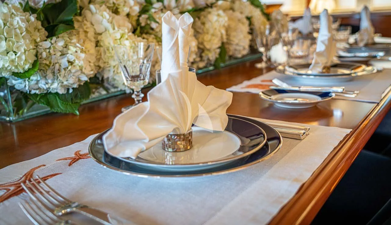 a white cake with a slice missing aboard ASTERIA Yacht for Charter