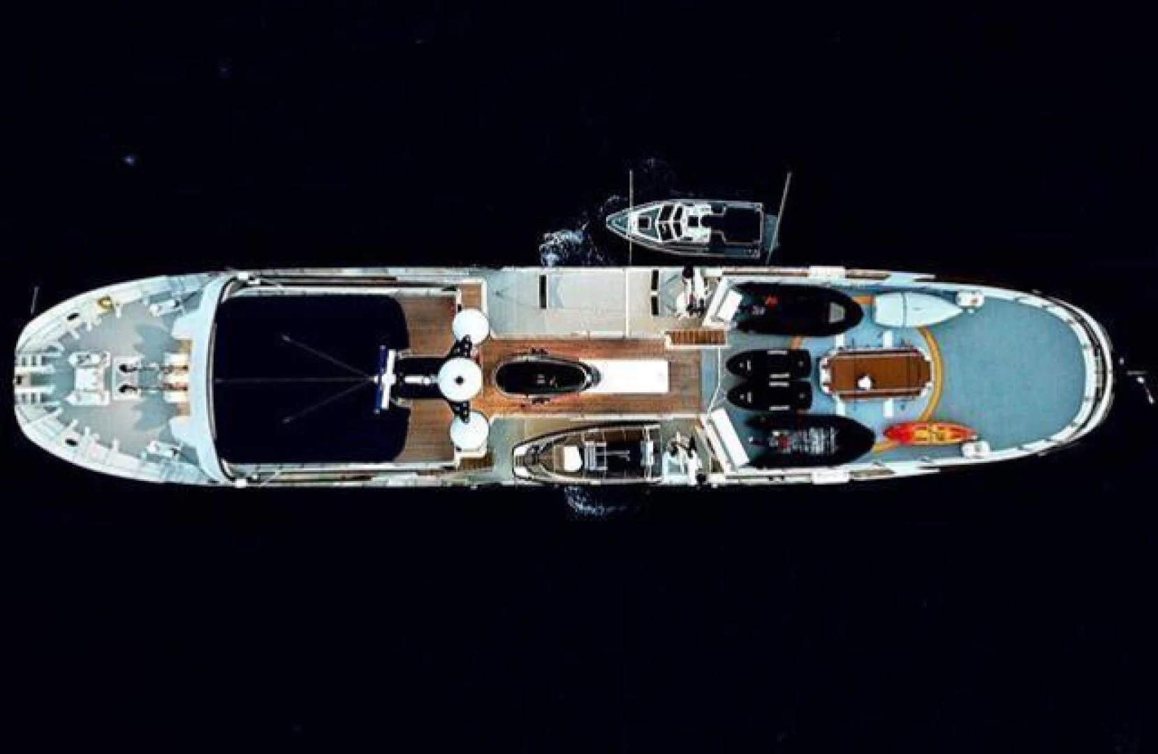 a close-up of a black and silver guitar aboard ASTERIA Yacht for Charter