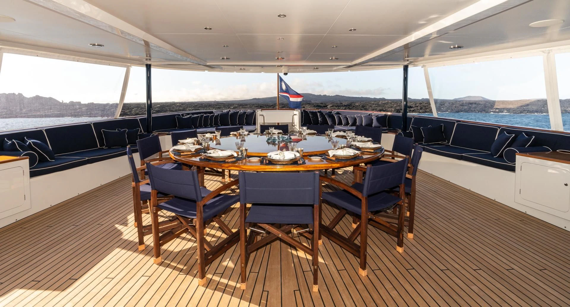 a dining table in a room aboard ASTERIA Yacht for Charter