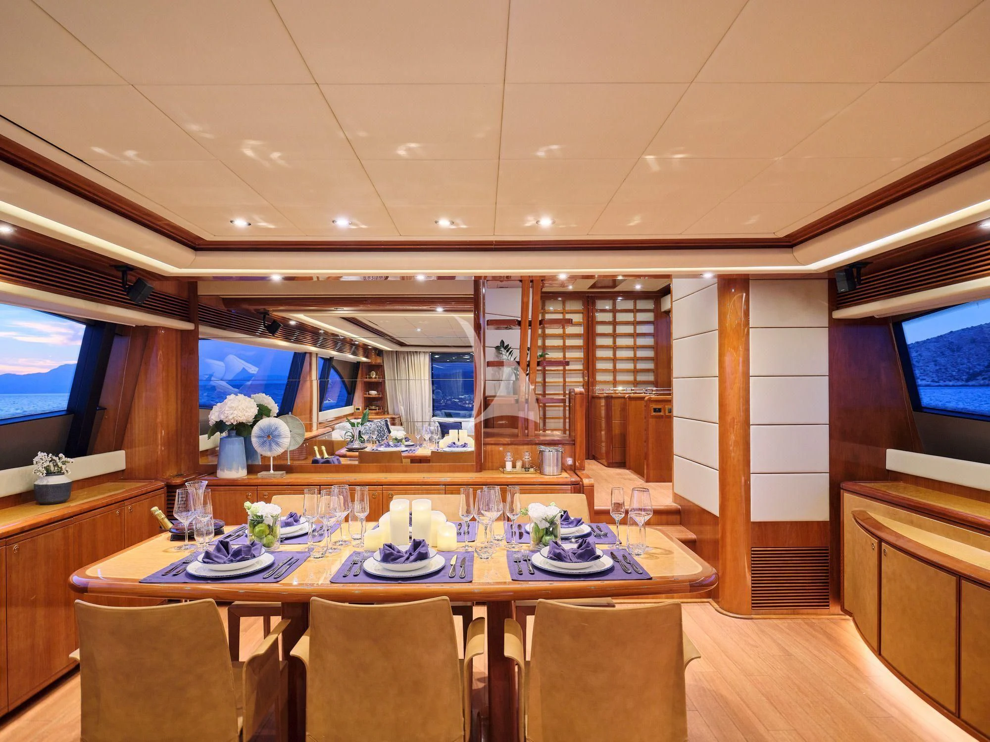 a room with a table and chairs aboard ESTIA YI Yacht for Sale