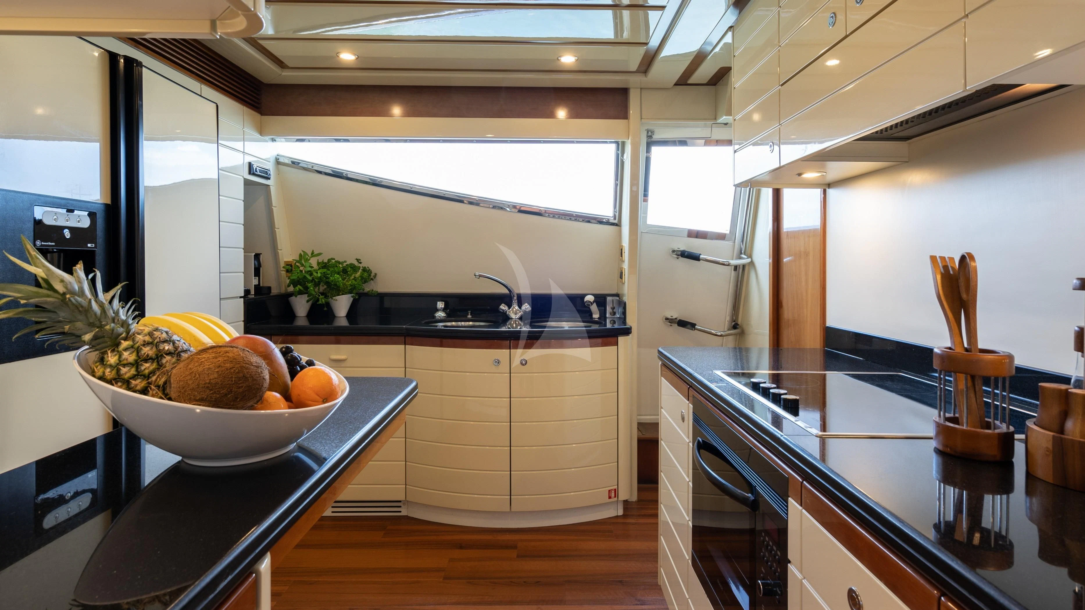 a bowl of fruit on a counter aboard ESTIA YI Yacht for Sale