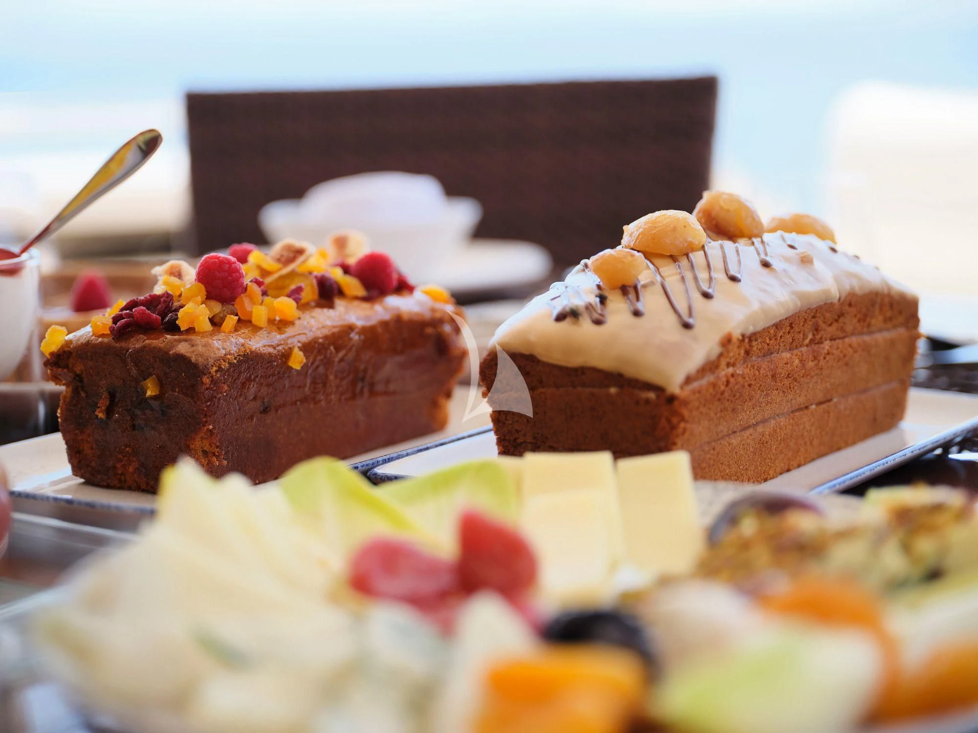 a plate of desserts aboard ESTIA YI Yacht for Sale