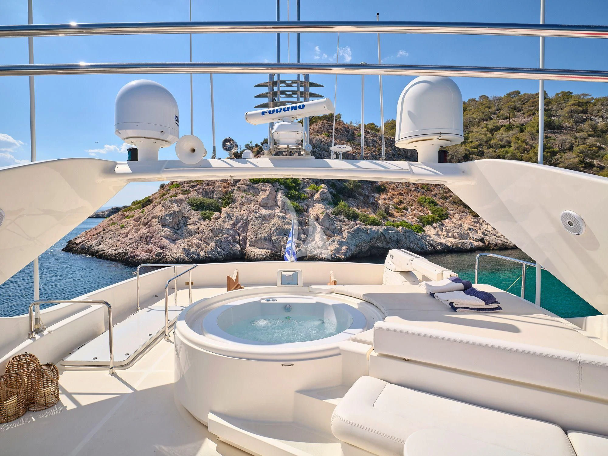 a large bathroom with a large rock wall aboard ESTIA YI Yacht for Sale