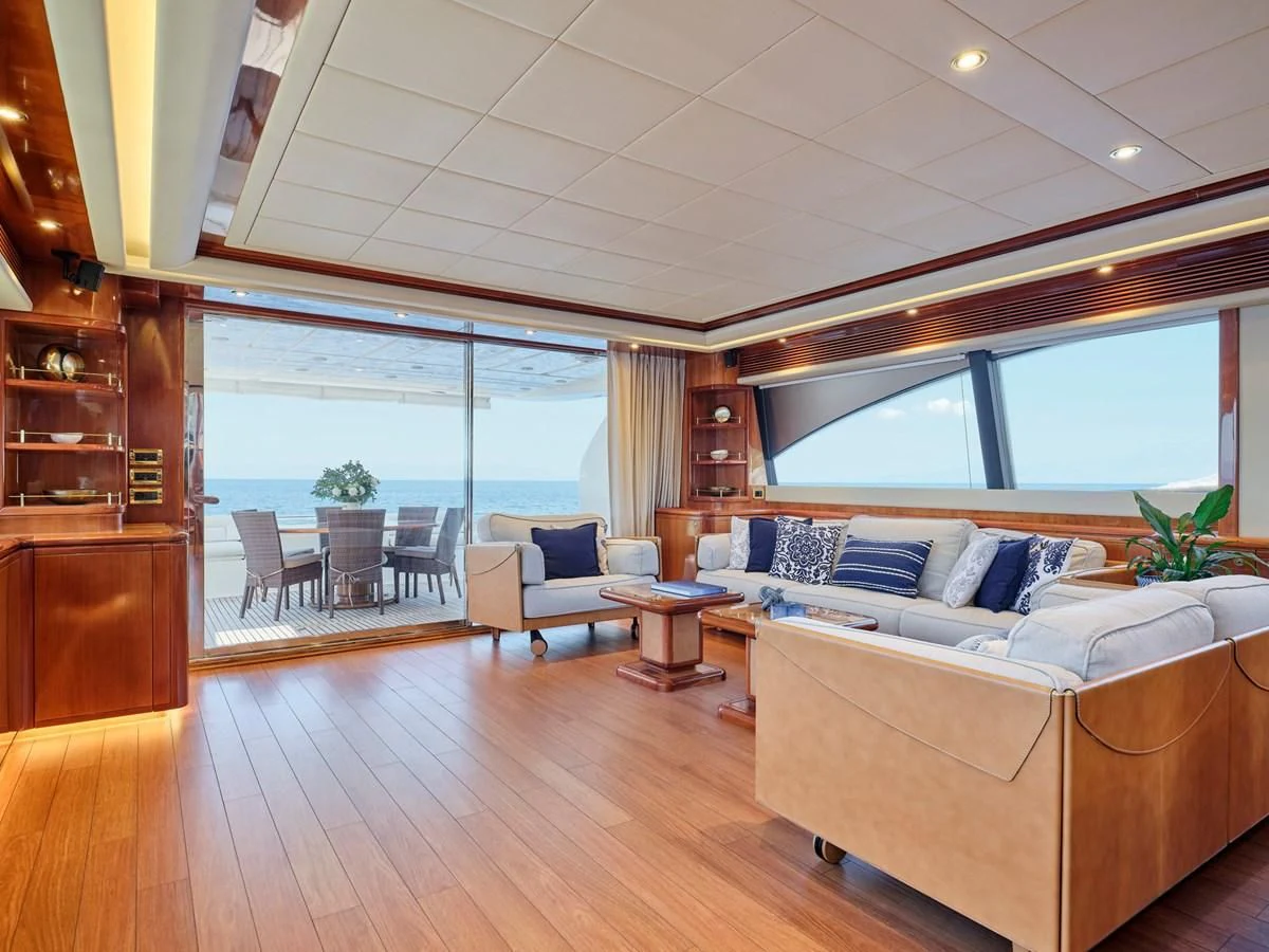 a living room with a large window aboard ESTIA YI Yacht for Sale
