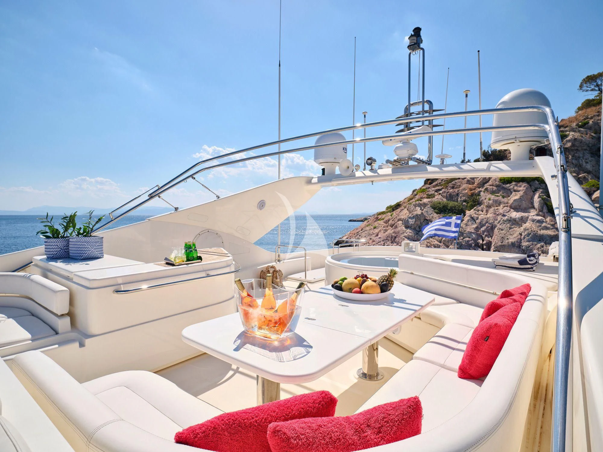 a balcony with a view of the ocean and the beach aboard ESTIA YI Yacht for Sale