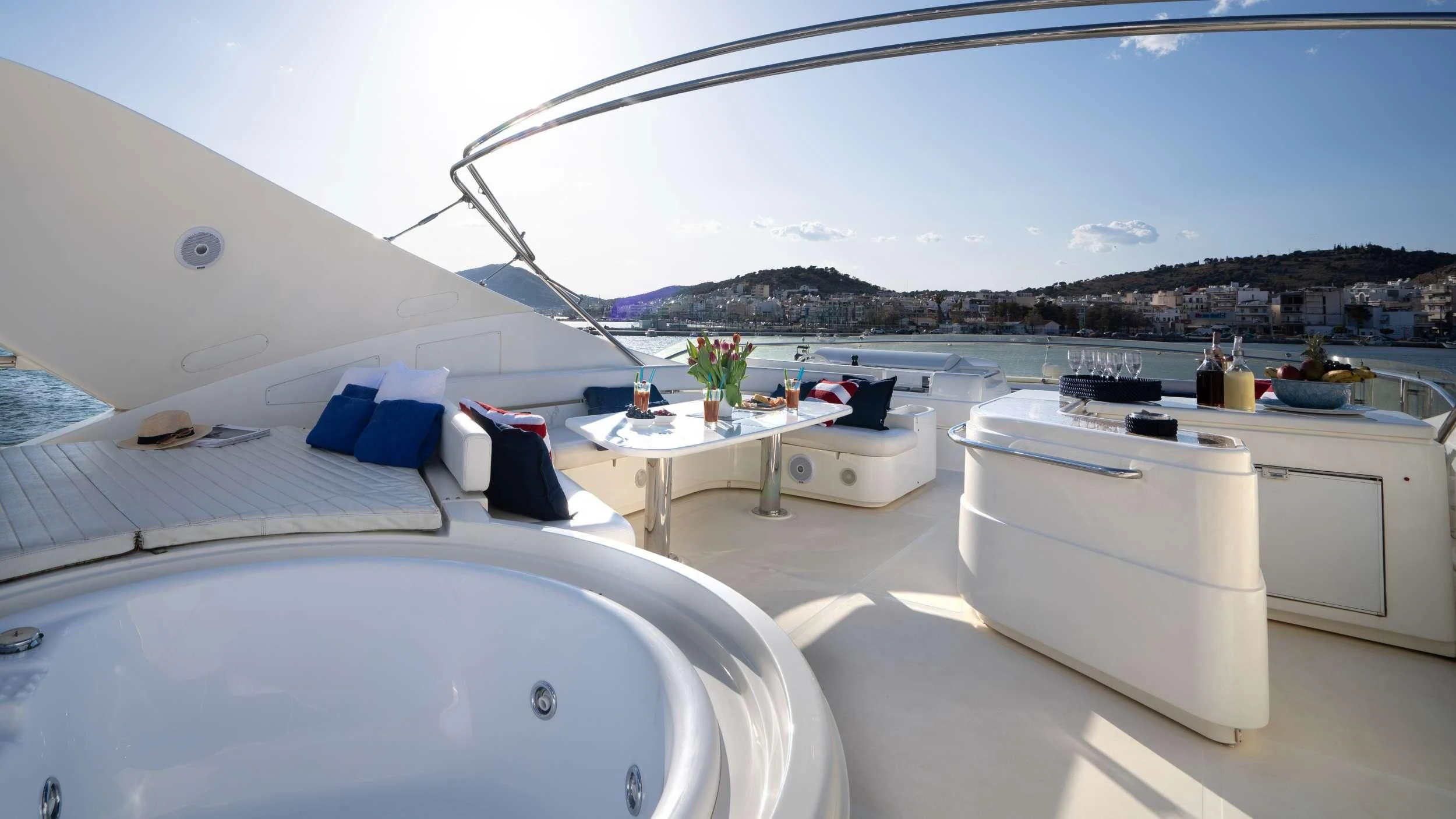 a room with a table and chairs aboard ESTIA YI Yacht for Sale