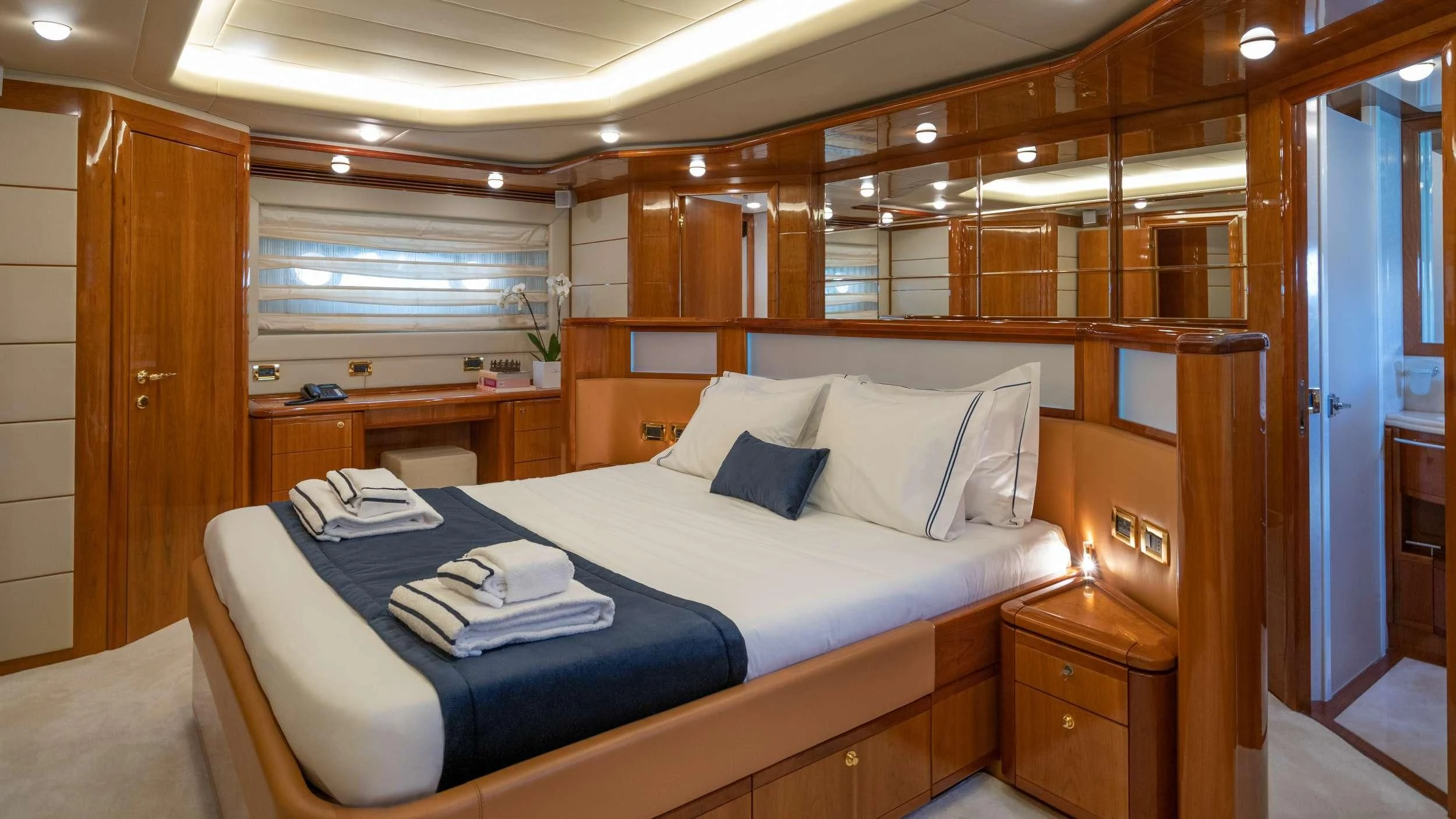 a bed in a room aboard ESTIA YI Yacht for Sale