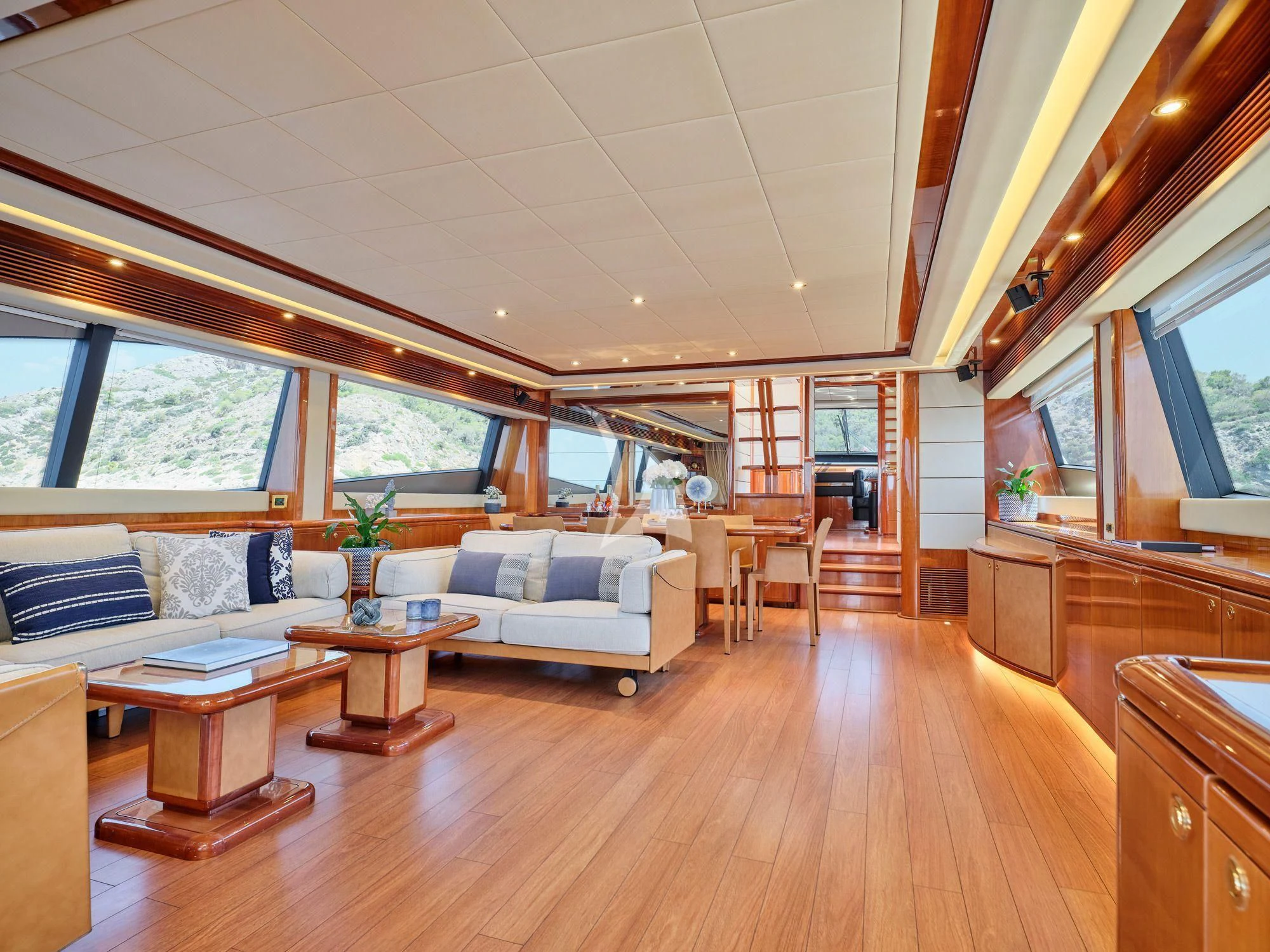 a living room with a wood floor aboard ESTIA YI Yacht for Sale