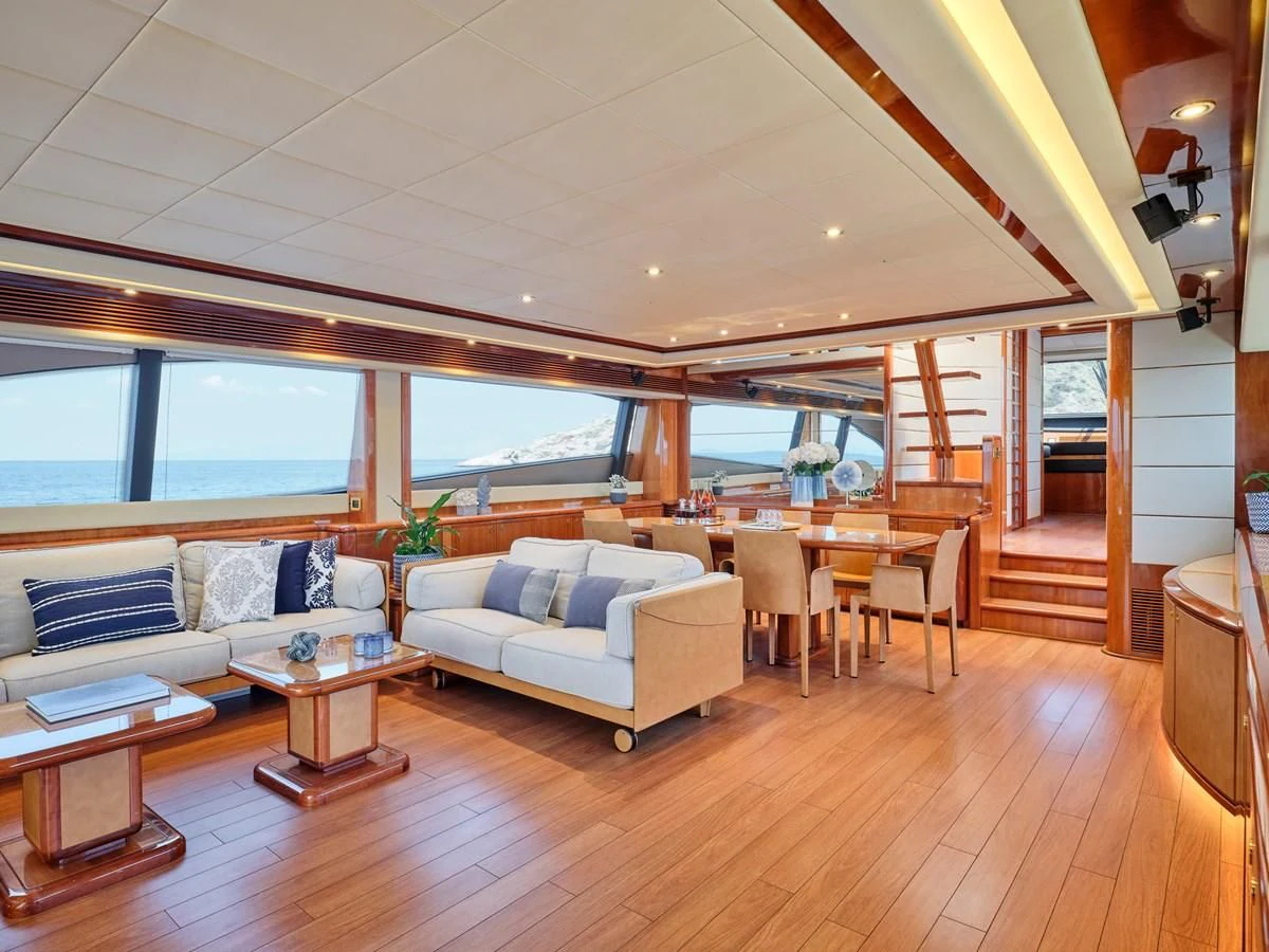 a living room with a large window aboard ESTIA YI Yacht for Sale